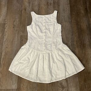 White button up low back mini dress with ruffle hem